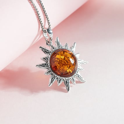 Silberner Anhänger in Form einer Sonne Mataha