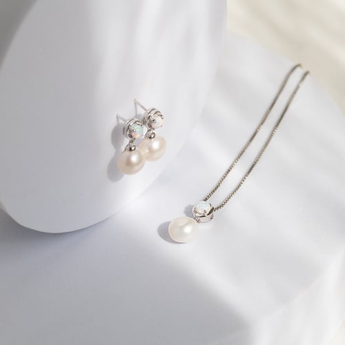 Silbernes Schmuckset aus Perlenschmuck mit Lab Grown Opalen Jasna