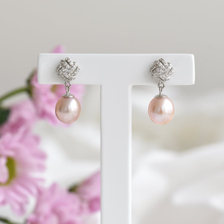 Silberne Ohrringe mit lavendelfarbenen Perlen und Zirkonia Ivona 83566